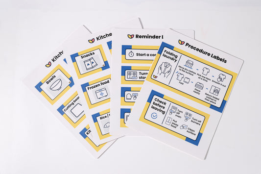 A sheet of The Familiar Space™ reusable TPE home labels with clear icons.