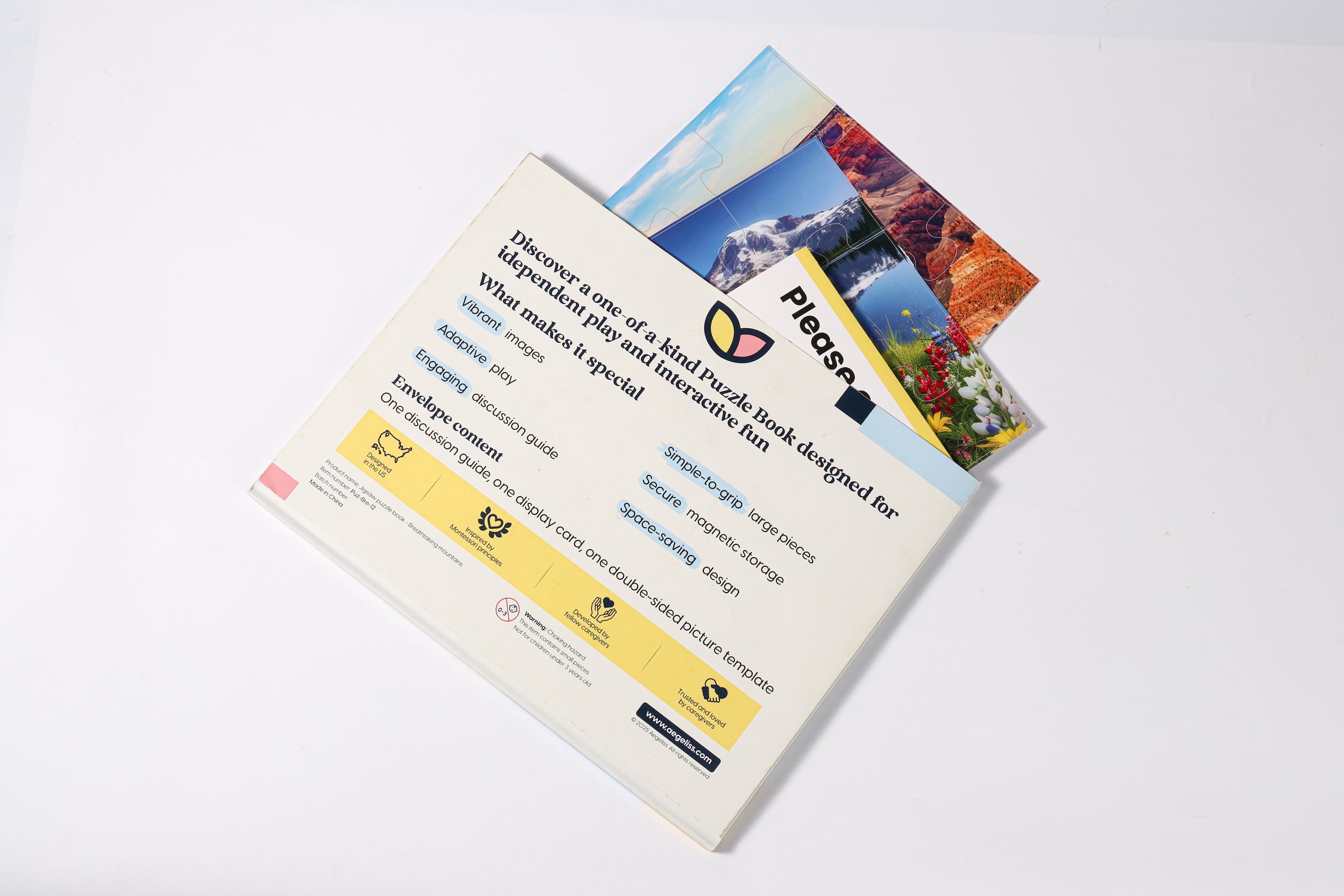 The 2-in-1 Breathtaking Mountains puzzle book, closed.