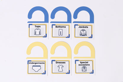 A sheet of The Familiar Space™ reusable TPE home labels with clear icons.