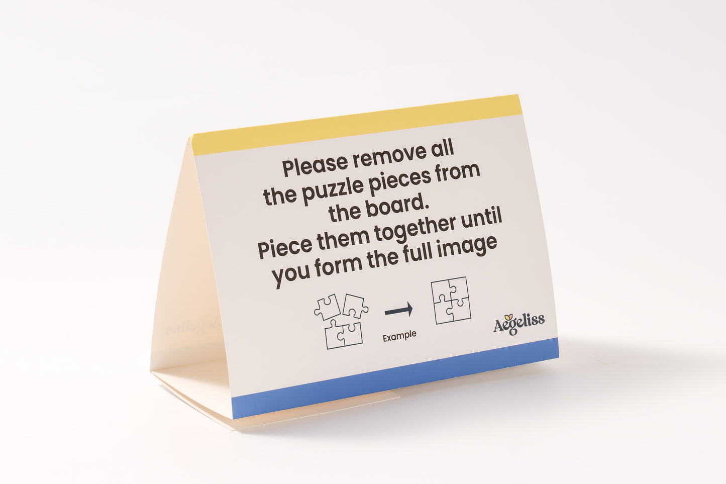 The 2-in-1 Breathtaking Mountains puzzle book, closed.