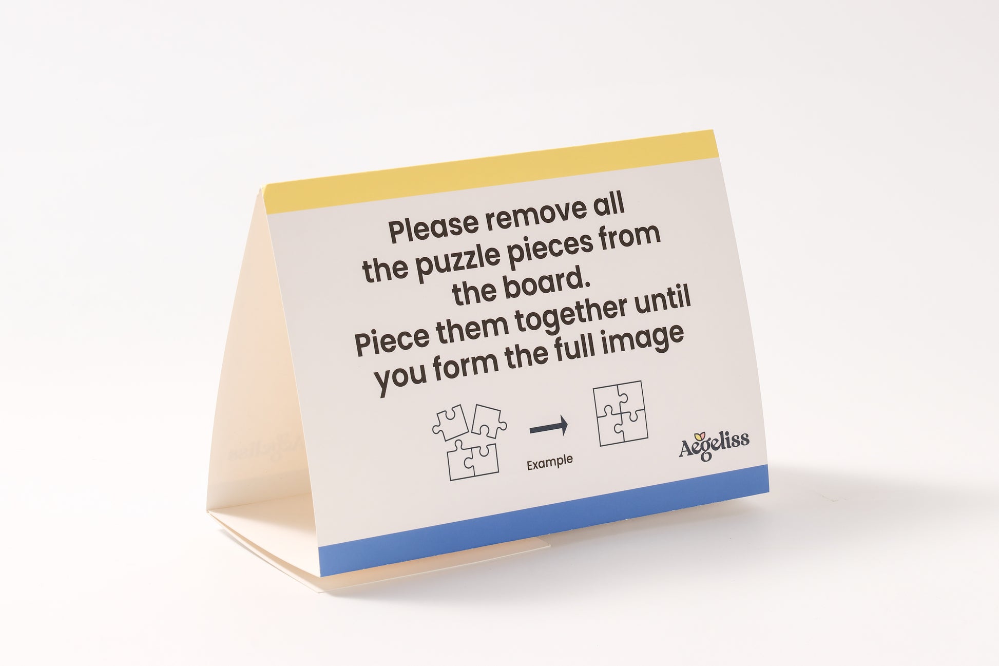 The 2-in-1 Breathtaking Mountains puzzle book, closed.