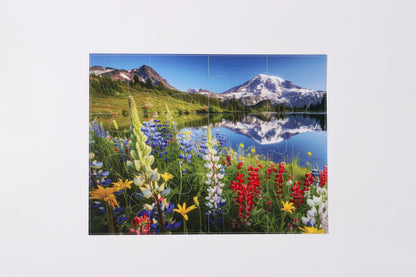 A person placing a thick, sturdy puzzle piece onto the untearable guided picture template.