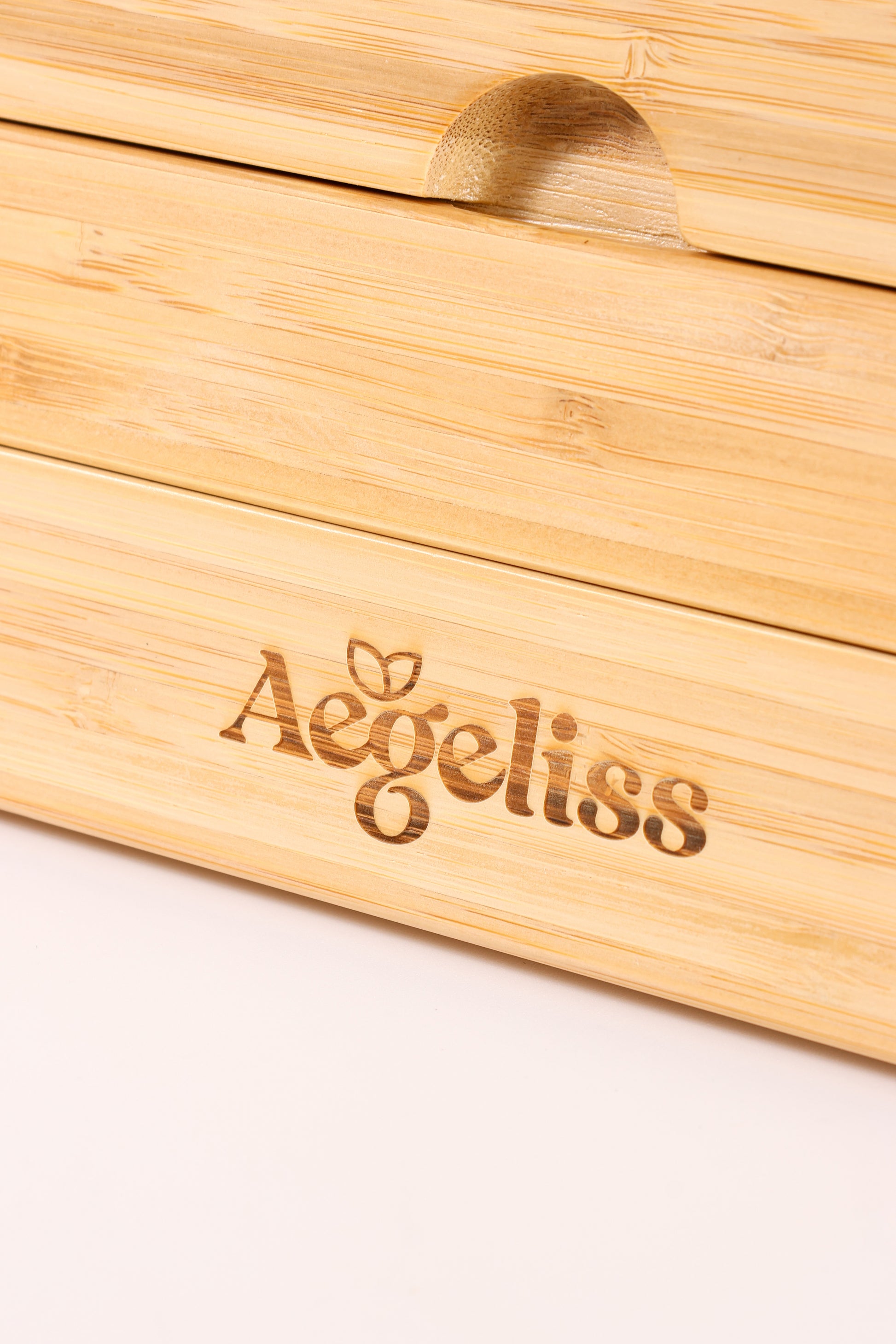 The Adjustable Bamboo Stand shown in two flat, interlocking pieces.