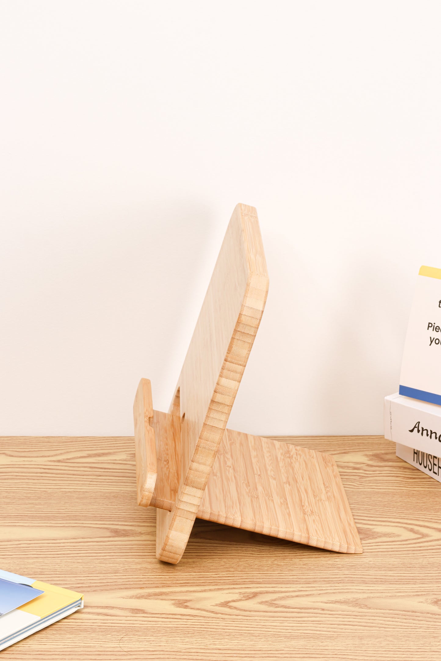 The Adjustable Bamboo Stand shown in two flat, interlocking pieces.