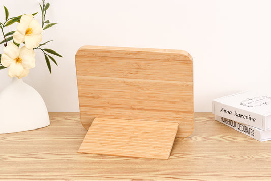 Assembled bamboo stand holding the 2-in-1 Breathtaking Mountains puzzle book.