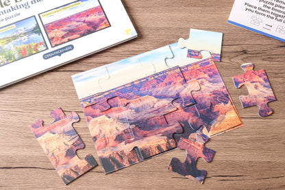 The 2-in-1 Breathtaking Mountains puzzle book, closed.